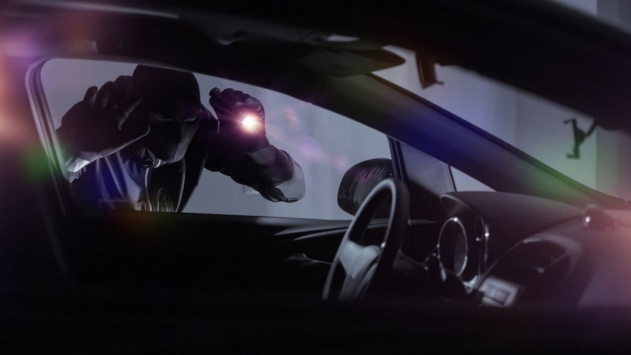 Car Robber with Flashlight